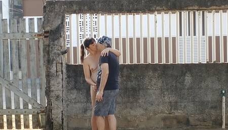 My wife and me dating in front yard