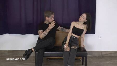 The couple smokes and uses the slave as an ashtray A mp4