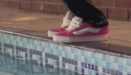 Fully clothed swimming with sneakers