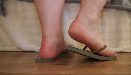 #8 Brown flip flops