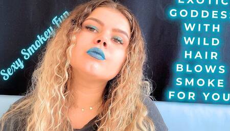 Exotic Goddess with Wild Hair Blows Smoke for You