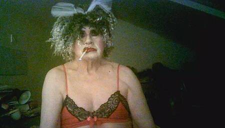 Sarah shitcunt Millward smokes and  flaunts herself for custom, like the whore she is