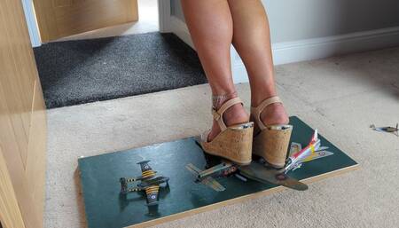 Requested clip Nikkichick crushes 3 planes in big wedges with painted toe nails & some toy cars high left view