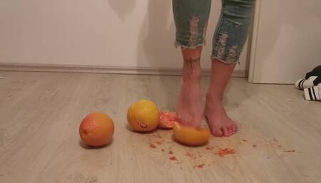 Stella crushing grapefruits barefoot