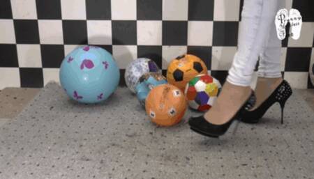 Soccer balls under metal Heels 4