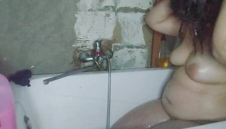 Camera in the Bathroom and a Girl with a Big Ass Is Peeing, Very Sexy