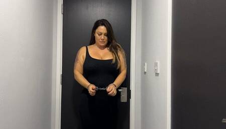 Rara in isolation hand cuffed and shackled in tracksuit