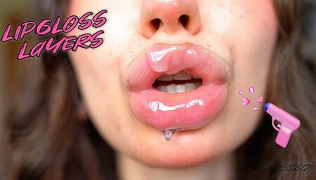 Wet messy lipgloss layers and pouting kisses