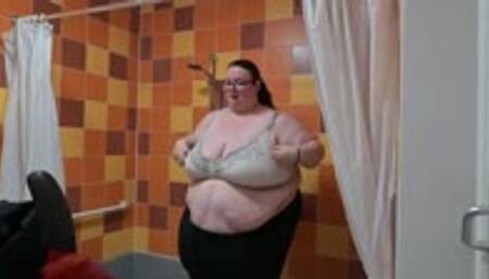 SSBBW GIANT SQUEEZES INTO SWIMWEAR WITH HELP FROM A FRIEND