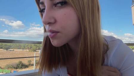 HANDY SMOKING ON THE BALCONY