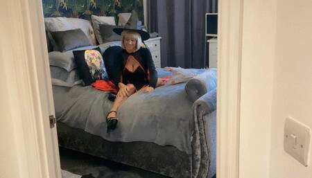 Balloons on the bed in my Halloween costume