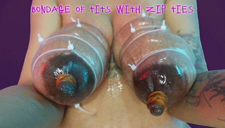 Bondage of tits with zip ties