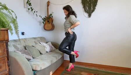 one shoe hopping in leather pants m0