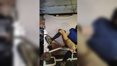 Football jock stretching himself