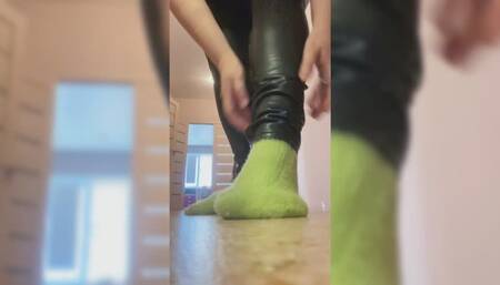 Pumping car’s pedals with sneakers