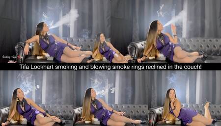 Tifa Lockhart smoking and blowing smoke rings reclined in the couch!