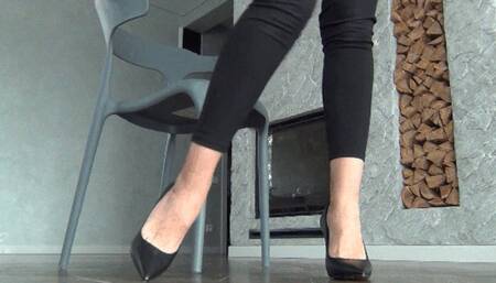 Dipping sexy feet and black leather shoes a