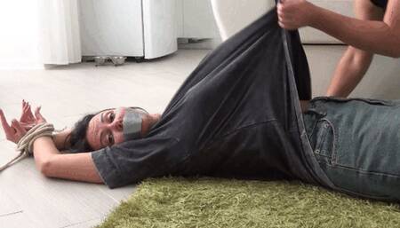 LORY squirms cries and struggles against the tickling BB