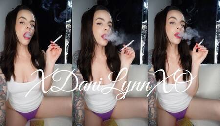 Smoking 100s in Purple Thong