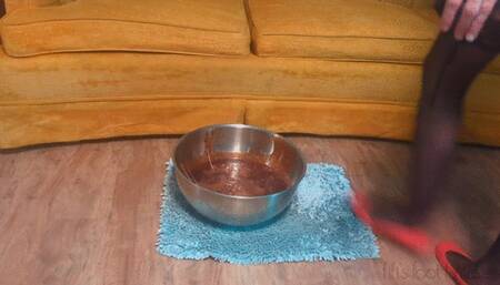 Fifi sinking red rubber flats into ankle deep melted gummies