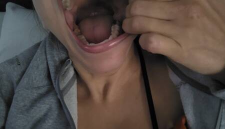 Pulling cheeks fist stuffing