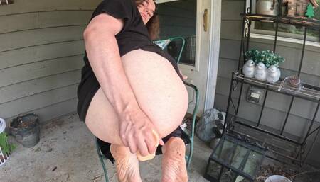 I went out to my back porch and fucked myself with my dildo