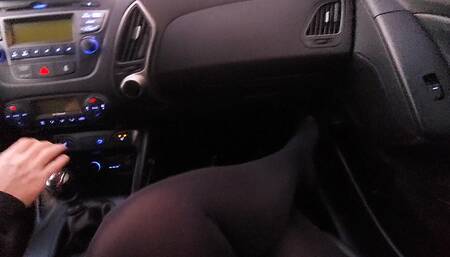 My stepmom teases me in the car with her legs in nylons