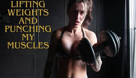 LIFTING WEIGHTS AND PUNCHING MY MUSCLES