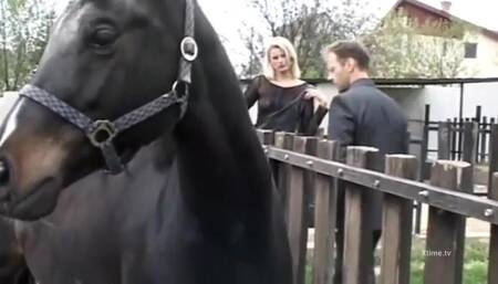 Hot blonde in the grip of two big hard cocks