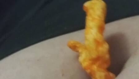 Eating cheetos from my belly button
