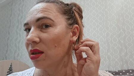 Two earrings in one ear