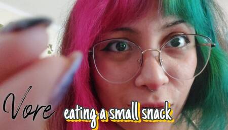 VORE eating a small snack