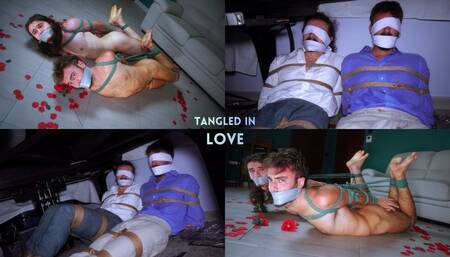 Tangled in love - Vito & Leon - 1080p - Two men tied up and blindfolded in the hideout, wearing elegant shirts and trousers. Naked men hogtied and gagged, with wrap around tape gag. Humiliated by a woman.
