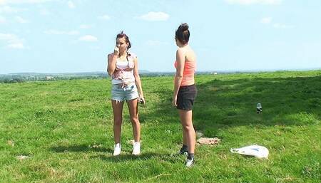 2 Girls Trampling Their Slave In A Field