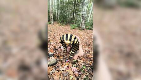 What's This Whore Doing in Those Leaves? on Her Knees?