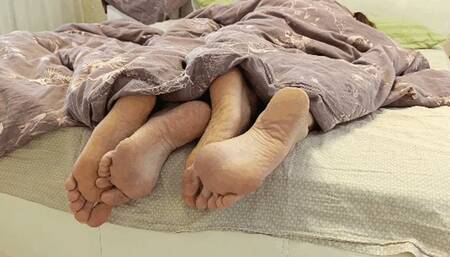 Flirting legs under the blanket f