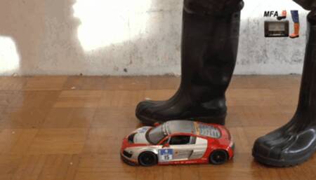 RC Car and wooden floor under my spike Wellies