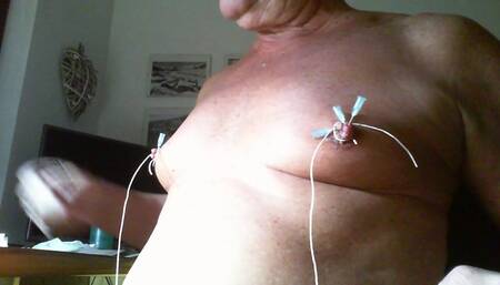 BDSM needles in the nipples
