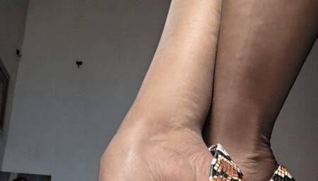 Milah Heel Popping her beautiful python stilettos off her highly arched feet