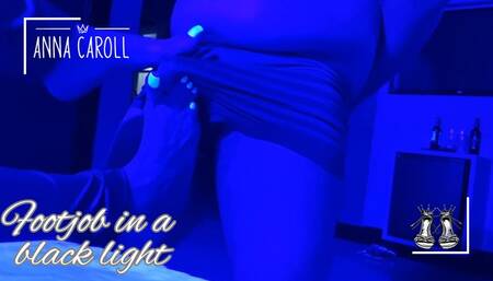 Foot fetish in a motel with black light.