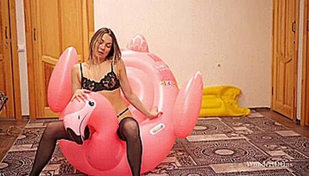Emma loud popping inflatable flamingo