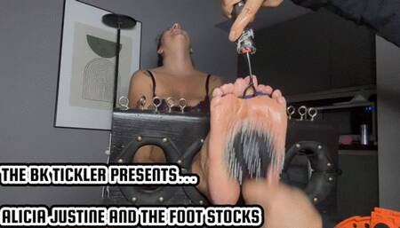 ALICIA JUSTINE AND THE FOOT STOCKS