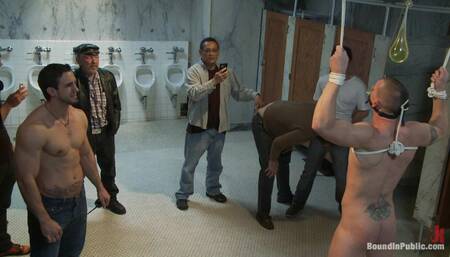 The Wrestler Gets Gang Banged by a Horny Crowd in a Public Restroom for Losing His Match.