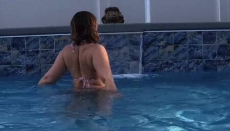 Carissa’s wet hair in the pool waterfall and hot tub jet arc