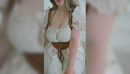 A Wife in an Elegant Blouse Enjoys Her Large Breasts and Cleavage.