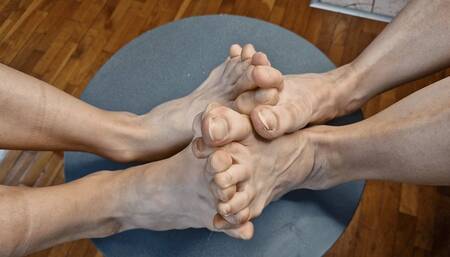 Toes Interlocked and Pressed Together