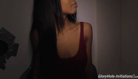 Ebony teen Nia Nacci takes white cock at a gloryhole