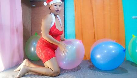 Santa's Sexy Helper Juju Sits To Pop Your Big Punch Balloons