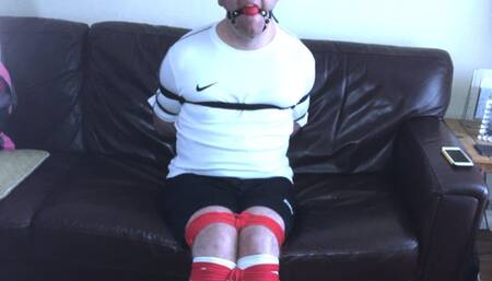 Tightly bound and Gagged Footballer gets his Ballsbusted by Femdom